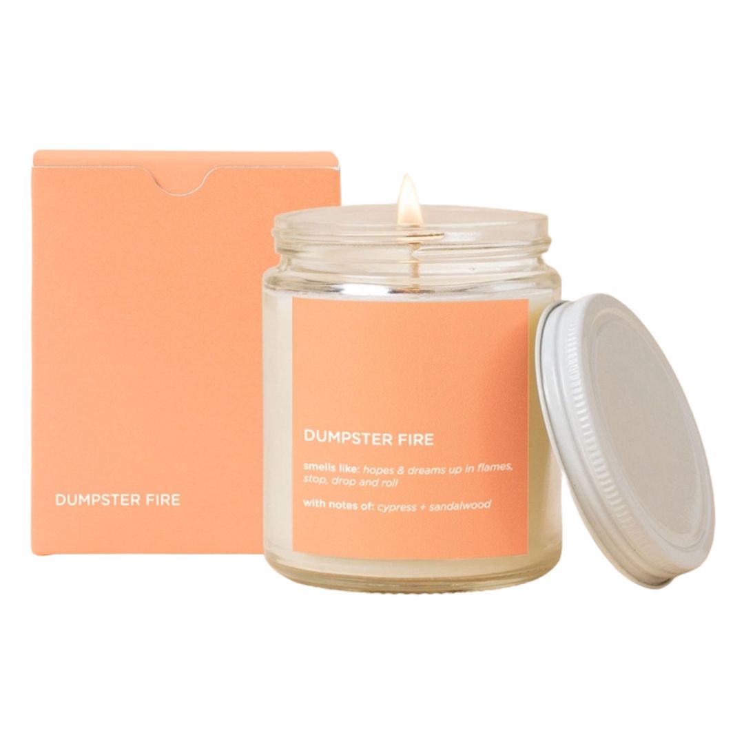 Dumpster Fire Candle – A funny, soy-based candle with cypress & sandalwood scent, perfect for stress relief & office humor.