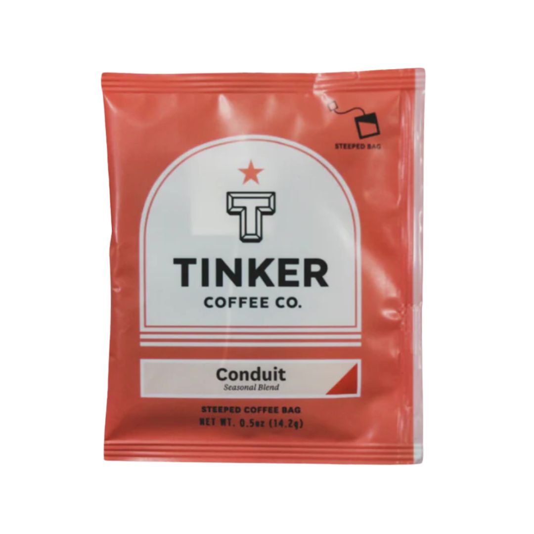 Tinker Conduit Steeped Coffee – A single-serve, biodegradable coffee pack for rich, flavorful coffee on the go. Just steep like tea for the perfect cup!