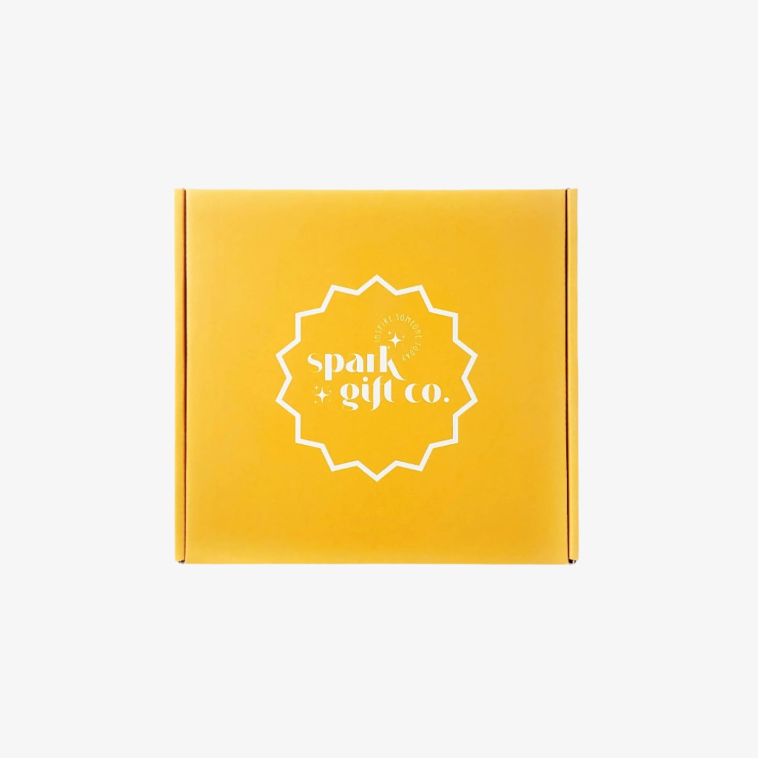 Image of yellow mailer box with Spark gift co logo in white