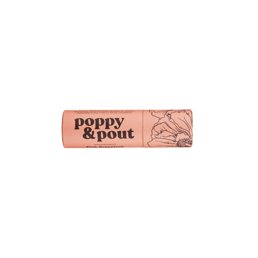 Poppy & Pout Pink Grapefruit Lip Balm in a recyclable cardboard tube. A hydrating, 100% natural lip balm with a refreshing citrus scent.