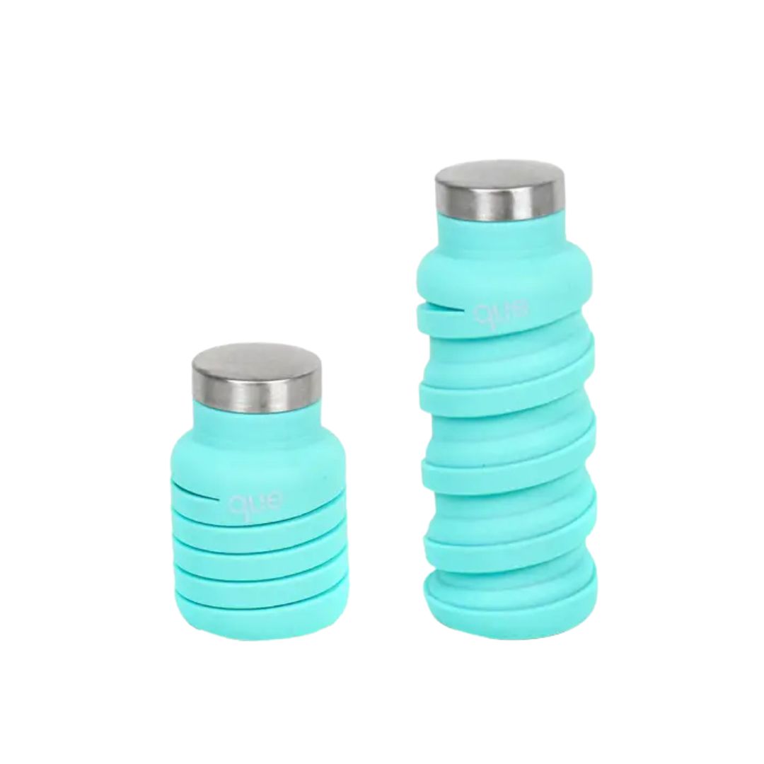 Que Factory Collapsible Bottle in Mint – A compact, BPA-free, silicone water bottle with a stainless steel cap. Leakproof, durable, and perfect for travel.